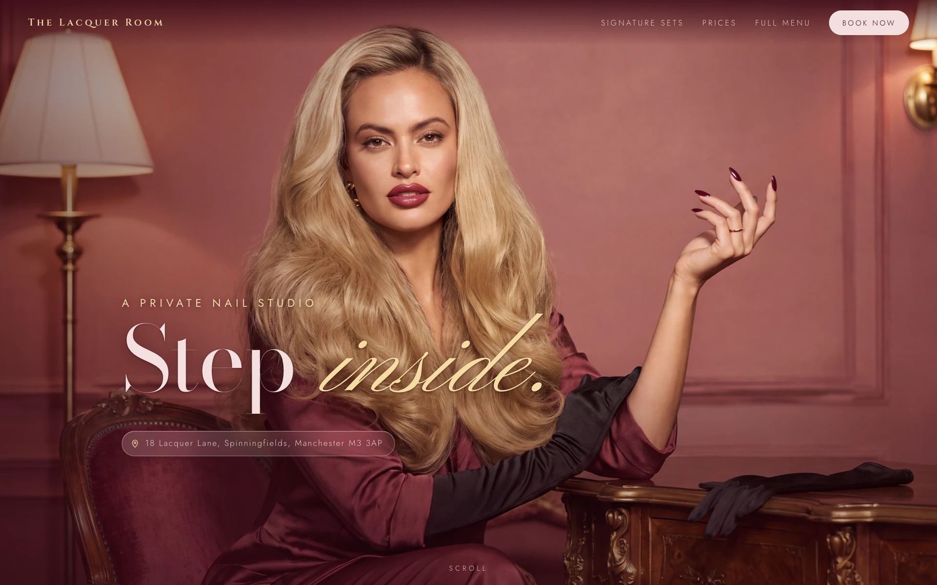 The Lacquer Room homepage: the owner seated in a rose-panelled room, raising a hand with burgundy nails, with the words Step inside